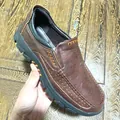 Ανδρικά καφέ δερμάτινα παπούτσια slip-on με κομψές πορτοκαλί ραφές και χοντρές σόλες - 40 / Καφέ