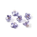 Close-up of pearlescent purple ABS flower charms with golden loops for DIY jewelry making. - Purple (4656)