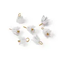 Detailed view of iridescent pearl flower pendants with gold rings for DIY jewelry. - White (4661)