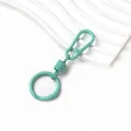 Primo piano di un moschettone a molla in lega di zinco verde macaron per portachiavi. - Mini Portachiavi Moschettone a Molla (AC4948) / 1 set / Verde lago