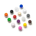 Macro view of various colorful round plastic spring cord locks for drawstring adjustment. - Double Hole Spring Adjustment Buckle / 10 Pieces Pack / Semi-transparent Random Mix
