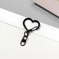 Vue détaillée d'un porte-clés mousqueton noir en forme de cœur pour bijoux DIY - 5 pièces/paquet / Noir