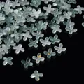 Macro view of frosted acrylic four-petal flower beads with elegant gold foil flecks - Gold Foil Four-Petal Flower Cap / 100 Pieces/Pack / Dark Green