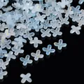 Detail view of blue gradient acrylic flower beads with gold foil for DIY jewelry making. - Gold Foil Four-Petal Flower Cap / 100 Pieces/Pack / Sky Blue