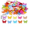Vue détaillée de boutons papillon colorés en plastique avec une mesure de 21,5 mm - Style Grand Papillon / Ensemble de 20 Pièces