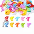 Mesures détaillées des boutons en plastique colorés en forme de pied pour projets DIY créatifs - Style Empreintes / Ensemble de 20 Pièces