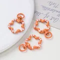 Cierre de resorte naranja en forma de flor con rayas pintadas para accesorios DIY - 1 Pieza (28x41mm) / Naranja