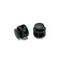 Detail view of two black round double-hole plastic spring cord locks for drawstring adjustment. - Double Hole Spring Adjustment Buckle / 10 Pieces Pack / Solid Black