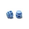 Close-up detail of light blue round double-hole plastic spring cord toggle locks - Double Hole Spring Adjustment Buckle / 10 Pieces Pack / Solid Light Blue