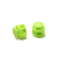 Close-up of lime green round double-hole plastic spring cord locks for elastic ropes - Double Hole Spring Adjustment Buckle / 10 Pieces Pack / Solid Light Green