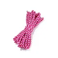 Détail d'un paquet de corde en coton torsadé rose et blanc pour l'artisanat et les cadeaux. - Rose Blanc