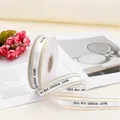 Dettaglio nastro bianco bordato d'oro con scritta Best Wishes For You per regali - Confezione da 2 Metri / Bianco