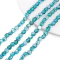 Nahaufnahme von 8mm facettierten blauen Kristallglasperlen für DIY-Schmuckherstellung - Transparent Pfauenblau