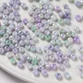 Cuentas de vidrio facetadas de 6mm en colores caramelo con efecto teñido para DIY. - Paquete de 40 / Verde Púrpura