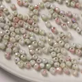 6mm bonbonfarbene facettierte Glasperlen mit wassergefärbtem Marmoreffekt für DIY-Schmuck - Hellgrün Rosa