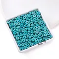 Close-up macro view of 6mm turquoise heishi beads showing 1.5mm and 2.5mm size details - Medium Heishi Style (AC4690) / 1 Strand (Approx. 148 Pcs)