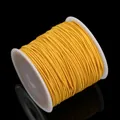 Bobina de cordón elástico amarillo de alta calidad para pulseras y joyería hecha a mano. - Amarillo