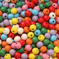 Mix van kleurrijke ronde houten Hemu-kralen met gaten voor DIY-sieraden en ambachten - Lichte mix / 50 Stuks (10mm) / Meerkleurig