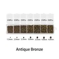 Gedetailleerd overzicht van antieke bronzen afstandskralen in zeven maten voor DIY-sieraden - 7-Vaks Doos / Antiek Brons