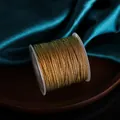 Iridescent gold-green chameleon cord 0.8mm for DIY jewelry making on spool - Brown