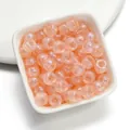 Peach mermaid finish acrylic barrel beads with large holes for DIY beading projects. - 50 Pieces/Pack (6x9mm) / Mermaid Orange