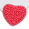 Perline cilindriche in vetro rosa confetto in ciotola a cuore per creazione gioielli - Rosso rosa