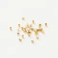 Detailed view of small 14K gold plated copper positioning tubes for jewelry making - 1.5mm Positioning Tube (Pack of 100) (GA0067) / 14K Gold