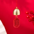 Traditional Chinese style festive red wind chime pendant featuring a golden bell detail - Get Rich