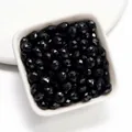 Vue détaillée de perles en acrylique facettées noires pour la fabrication de bijoux DIY - 3x4mm (100 pièces/paquet) / Noir