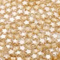 Transparente bernsteinfarbene Glasperlen in Sternform für DIY-Schmuck - 50 Stück/Packung / Champagner