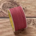 Close-up detail of 2.5mm maroon braided nylon cord for DIY jewelry making crafts - Deep Pink