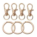Detail view of 4 gold lobster clasps and 3 flat key rings for DIY jewelry making. - 10 Sets Pack (32mm/25mm) / KC Gold