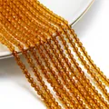 Dettaglio macro di perle di cristallo rondelle sfaccettate ambra da 3mm per gioielli DIY - 1 Filo (Circa 127 Pezzi), Diametro 3mm/Foro 0.8mm / marrone chiaro
