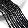 Primo piano di perline di cristallo sfaccettate nere da 3mm per gioielli fai da te su piatto. - 1 Filo (Circa 127 Pezzi), Diametro 3mm/Foro 0.8mm / Nero
