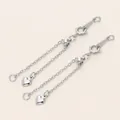 Silberfarbene Schmuck-Verlängerungskette mit Karabinerverschluss und Herzanhänger für DIY - 4er Set / Platiniert Verstellbare Kette