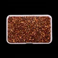 Close-up detail of metallic bronze irregular crushed glass stones for DIY nail art decorations - 80g Box / Bright Brown