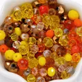 Mixed 4-8mm warm tone faceted crystal beads for DIY jewelry making and beadwork projects. - 1 Pack / Porcelain Gold