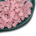 Detailed shot of frosted pink acrylic heart pendants for DIY jewelry making. - Heart Shape / 5 Pieces/Pack / Pink