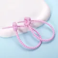Verstellbarer Silikon-Kabelbinder in Rosa mit Blumenbuckel für die Kabelführung - Pflaumenblüte / 2 Stück/Set / Hellviolett