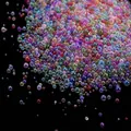 Macro detail of iridescent multi-colored no-hole glass bubble beads for DIY craft - 10g/Pack / Random Mixed Colors