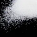 Close-up detail of iridescent no-hole glass micro-beads for DIY nail art and crafts - 0.4-0.6mm / 10g/Pack / Clear Iridescent
