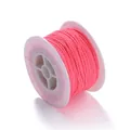 Close-up of bright pink non-elastic braided cord on white spool for DIY jewelry making - Thickness 2mm / Length 25m / 1 Roll / Pink