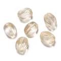 Détail macro de perles en verre en forme de grain de café champagne pour bijoux - Style Grain de Café (Style 02) / 5 Pièces (8.5x11mm) / Or Rose