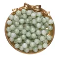 Green cracked texture round loose beads for DIY jewelry making displayed on gold tray - Pack of 50 (10mm / Hole 1.5mm) / Ink Wash Crackle Green
