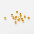 Macro detail view of 18K gold plated copper spacer beads for DIY jewelry making - 1.5mm (100 Pieces/Pack) / 18K Color-preserving Genuine Gold
