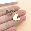 Detail showing colorful enamel bird pendant and its golden metal back view. - 1 Piece (28385) / Yellow Print Dove