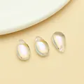 Exquisite macro detail of iridescent teardrop glass beads for DIY jewelry making crafts - Medium White Iridescent Glass Teardrop Bead (23694)