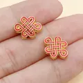 Perlina distanziatrice in lega nodo cinese rosso e oro per la creazione di gioielli fai da te - Perla Distanziatrice Nodo Cinese Rosso Piccola (22842) / 1 pezzo (14x10mm)