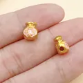 Glücksgeldbeutel Gold-Zwischenperle mit rosa Emaille und Segensgravur für Schmuck - Rosa Mattgold Friedens-Glücksbeutel Perle (28545)