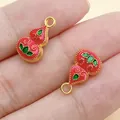 Chinese style red enamel Wu Lou gourd charms with gold alloy finish for jewelry DIY hobby. - Red and Green Double Sided Lotus Gourd (28500)